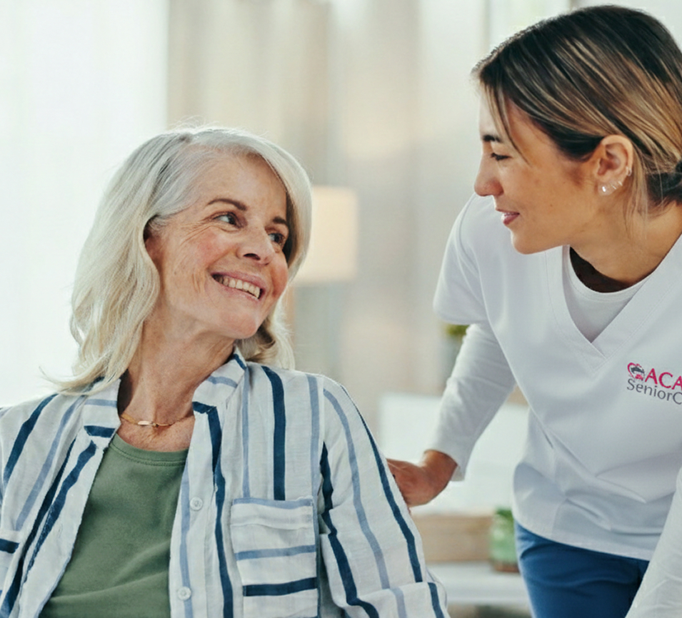 Caregiver providing support to an elderly woman